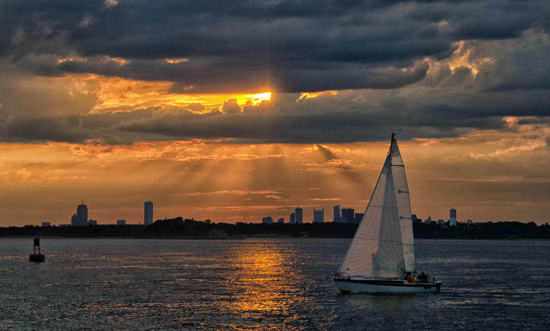 Hull, MA at sunset with Boston skyline